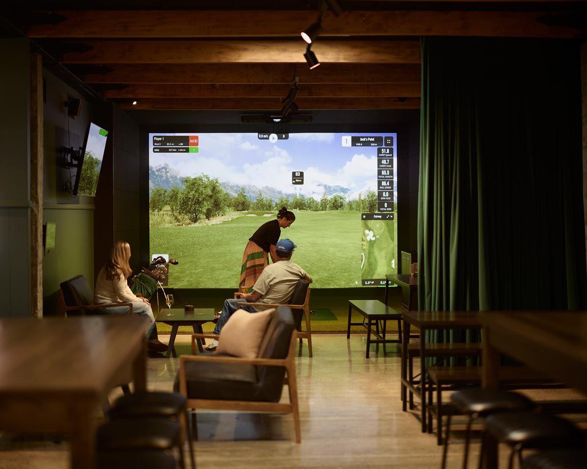 Alexander leather seating creating a comfortable lounge area around the golf simulator at The 19th