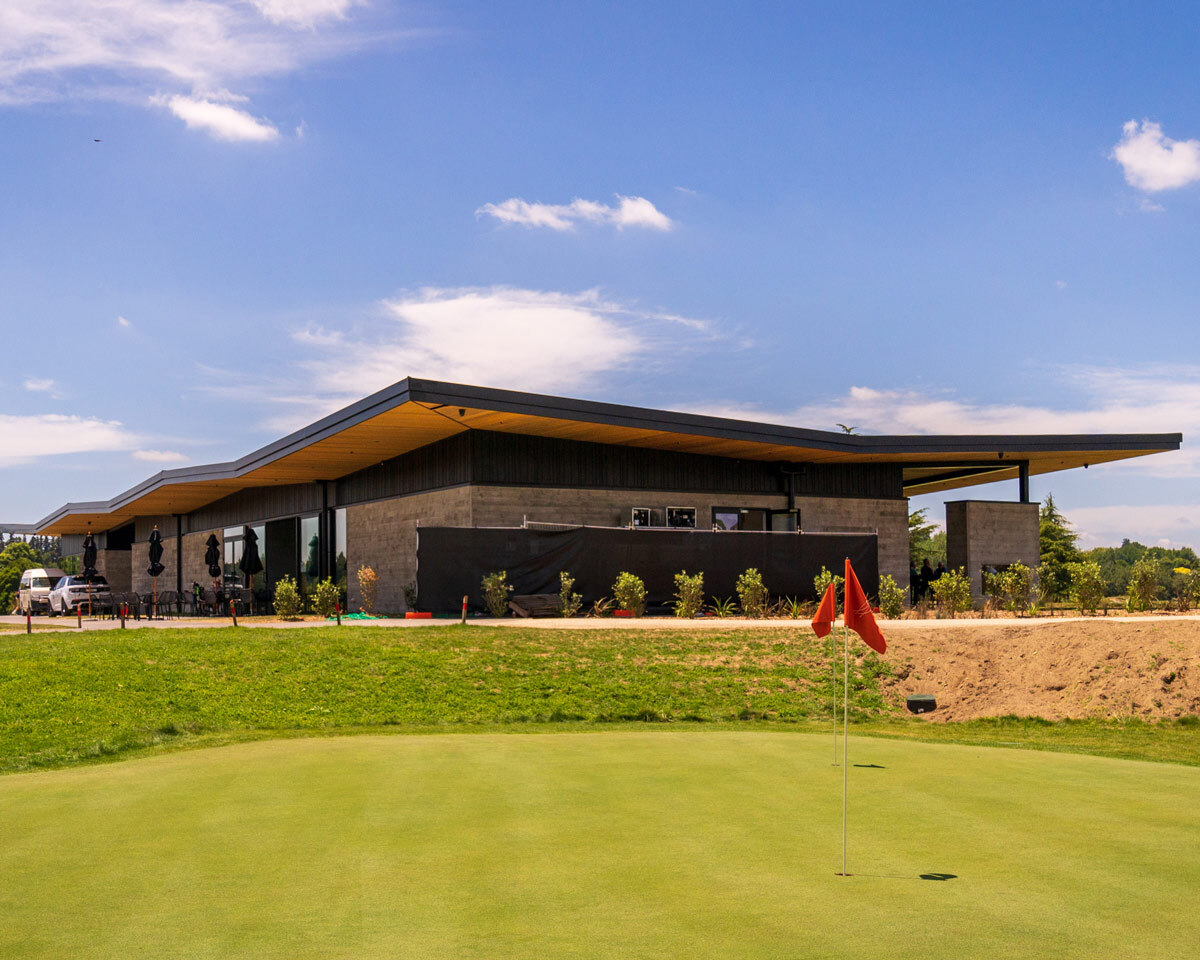 Exterior view of the Tieke Golf Estate clubhouse and hospitality venue beside the golf course.