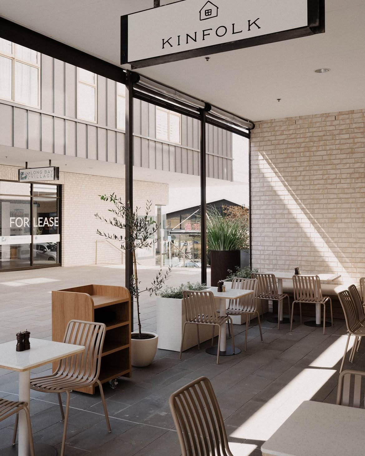 outdoor area at kinfolk cafe with parker chairs