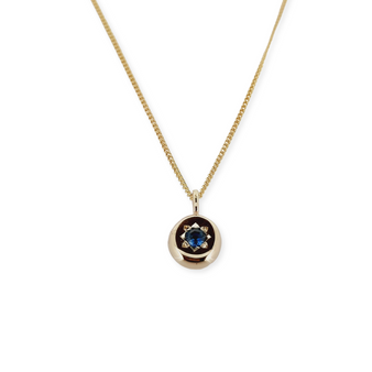 9ct Yellow gold necklace with a Londan Blue Topaz.
