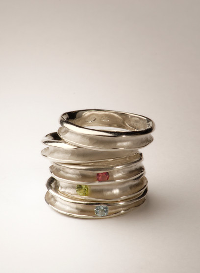 Stack of Groove rings, Sterling silver, pink Tourmaline, green Peridot, blue Topaz.