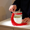 woman arranging the salt water cure jar