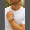 Man wearing a Hematite Pixiu Bracelet on his wrist