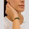 Woman wearing 18K Gold Pixiu Bracelet on her wrist