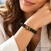 woman wearing the buddha protector bracelet for rabbit sign