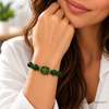 woman showcasing the green tara bracelet  amulet