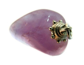 Amethyst dispelling nervousness, tension, and oversensitivity.