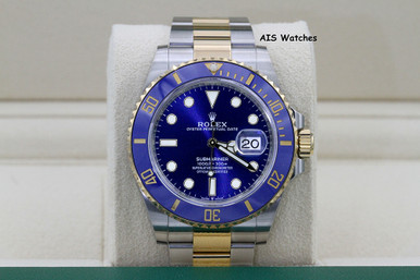 2007 Rolex Submariner Two-Tone with Blue Dial and Bezel, box, papers, and  tags.