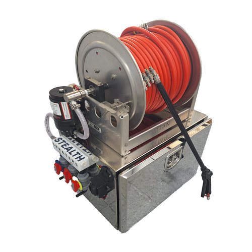 Corner view of the Stealth Spartan System highlighting the Stealth 18" Aluminum Full Frame Hose Reel and the compact, modular skid design for truck or trailer mounting.