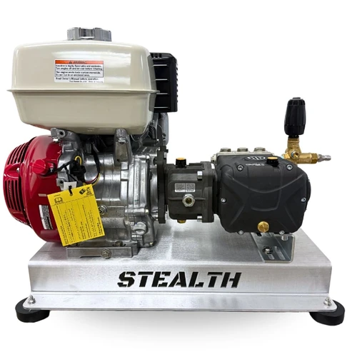 Three-quarter view of the Stealth Operator Series 5.5 GPM 3000 PSI gear-driven pressure washer skid, featuring a pull-start Honda GX390 engine and black AR RG2125HN pump mounted on a heavy-duty aluminum frame