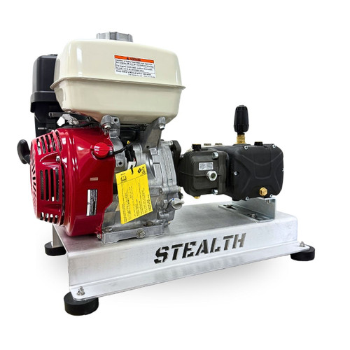 Side profile view of the Stealth Operator Series 5.5 GPM gear-drive skid, detailing the black textured gearbox housing, plumbing connections, and the aluminum base frame with integrated rubber feet