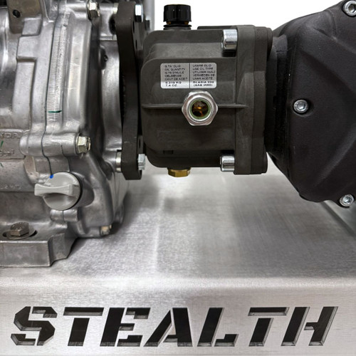 Detailed close-up view of the black oil-bath gear reduction box connecting the Honda GX390 engine block to the AR RG2125HN triplex plunger pump on a Stealth 5.5 GPM skid.