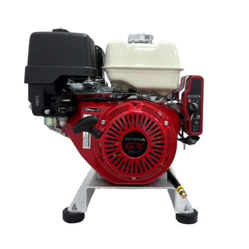 Front view of the Stealth RogueJet Series 4 GPM 4000 PSI pressure washer skid, focusing on the red electric-start Honda GX390 engine block, recoil pull-start assembly, and aluminum base frame