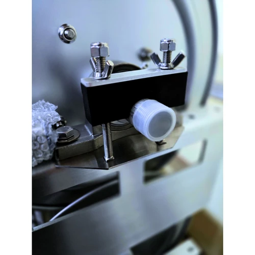 Close-up of the Stealth 12" Hose Reel internals, showing the 316 stainless steel 1/2" manifold and the included greasable stainless steel swivel designed for maximum chemical resistance and leak-free performance.