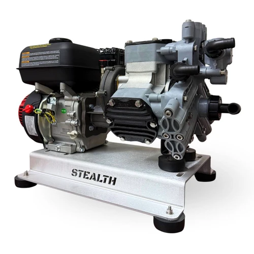 Three-quarter view of the Stealth P40 soft wash skid, showing the 11 GPM gear-driven Comet P40 diaphragm pump, CRX 210 pull-start engine, and aluminum skid frame with Stealth branding
