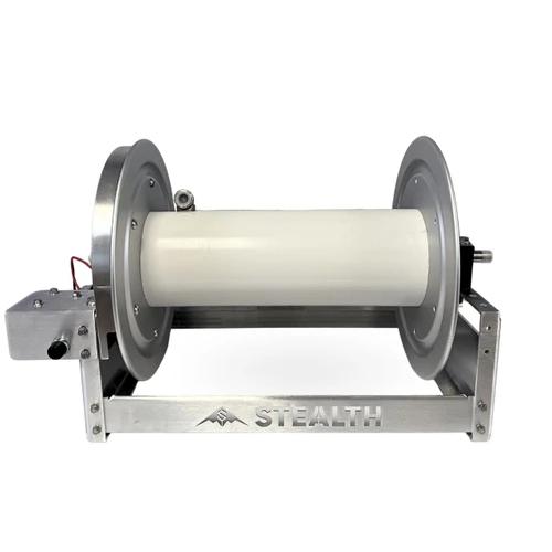 Direct front view of the Stealth Electric 18-inch aluminum full-frame hose reel, showcasing the clean white PVC core drum, structural aluminum frame with custom cut-out Stealth branding, and the side-mounted electric rewind motor