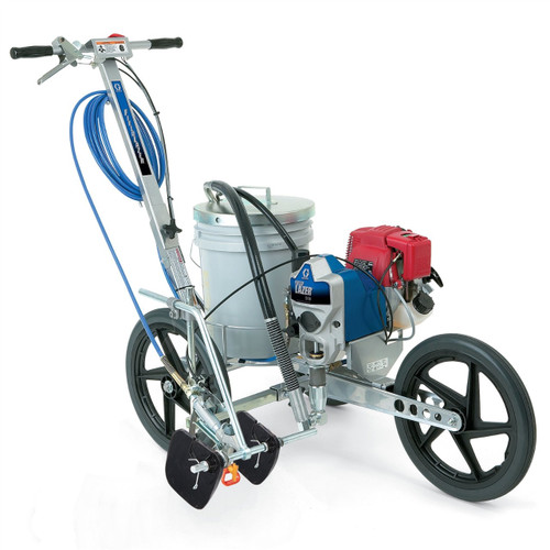 Graco 248942 FieldLazer S100 airless field striper featuring a Honda GX engine, a white 5-gallon paint bucket, and a three-wheel chassis designed for precision turf marking on athletic fields.