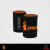 Spika can cooler with black neoprene body and orange logo — ideal for camping and Aussie outdoor lifestyle