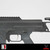 Detailed view of Barrett MRAD receiver markings including model, serial number, and Magpul grip on matte black finish