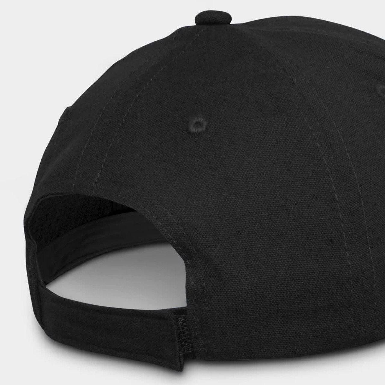 A black cap featuring a back strap and a logo on the side. The fabric appears sturdy and textured.