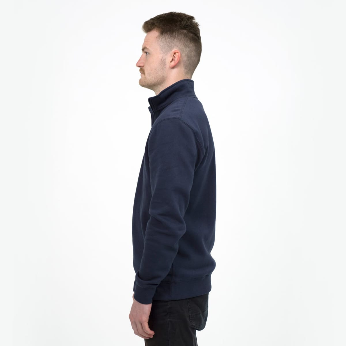 A navy quarter zip jumper in a unisex design, featuring a high collar and ribbed cuffs. It has a branding logo.