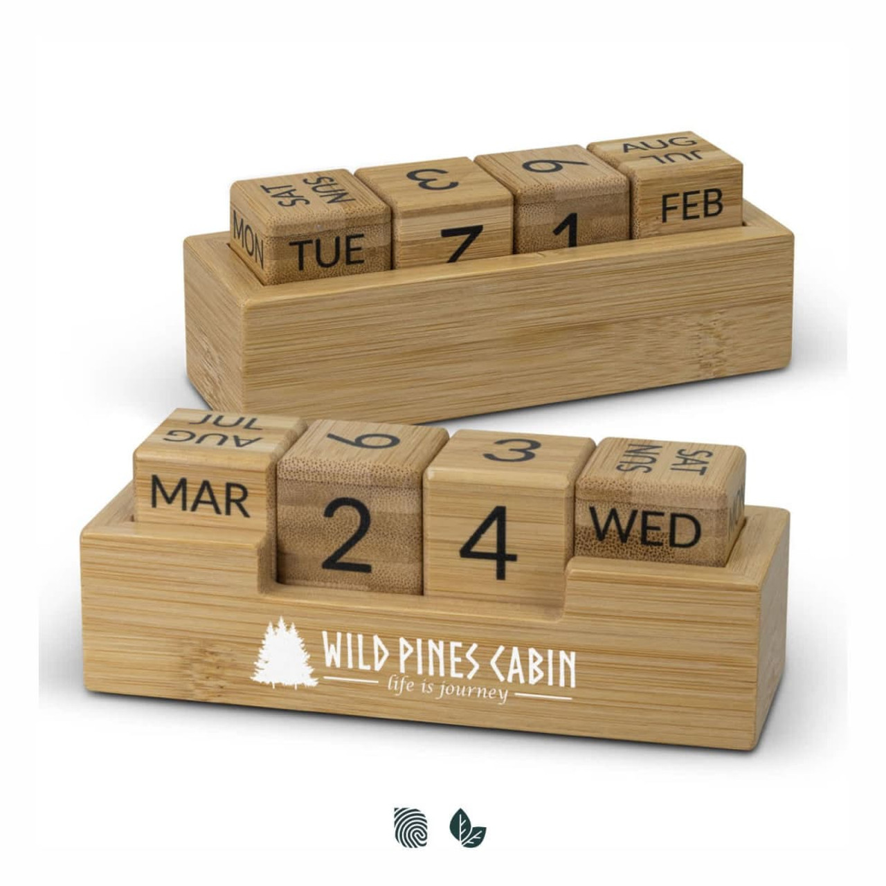 A bamboo desk calendar featuring engraved wooden blocks for days, months, and dates, with a white logo. A bamboo desk calendar featuring engraved wooden blocks for days, months, and dates, with a white logo.