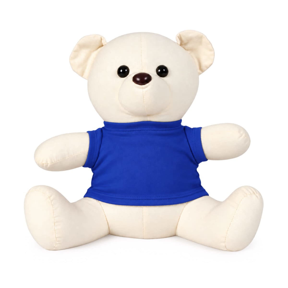 A plush toy bear in cream colour, wearing a blue t-shirt, with large black buttons for eyes and a friendly expression.