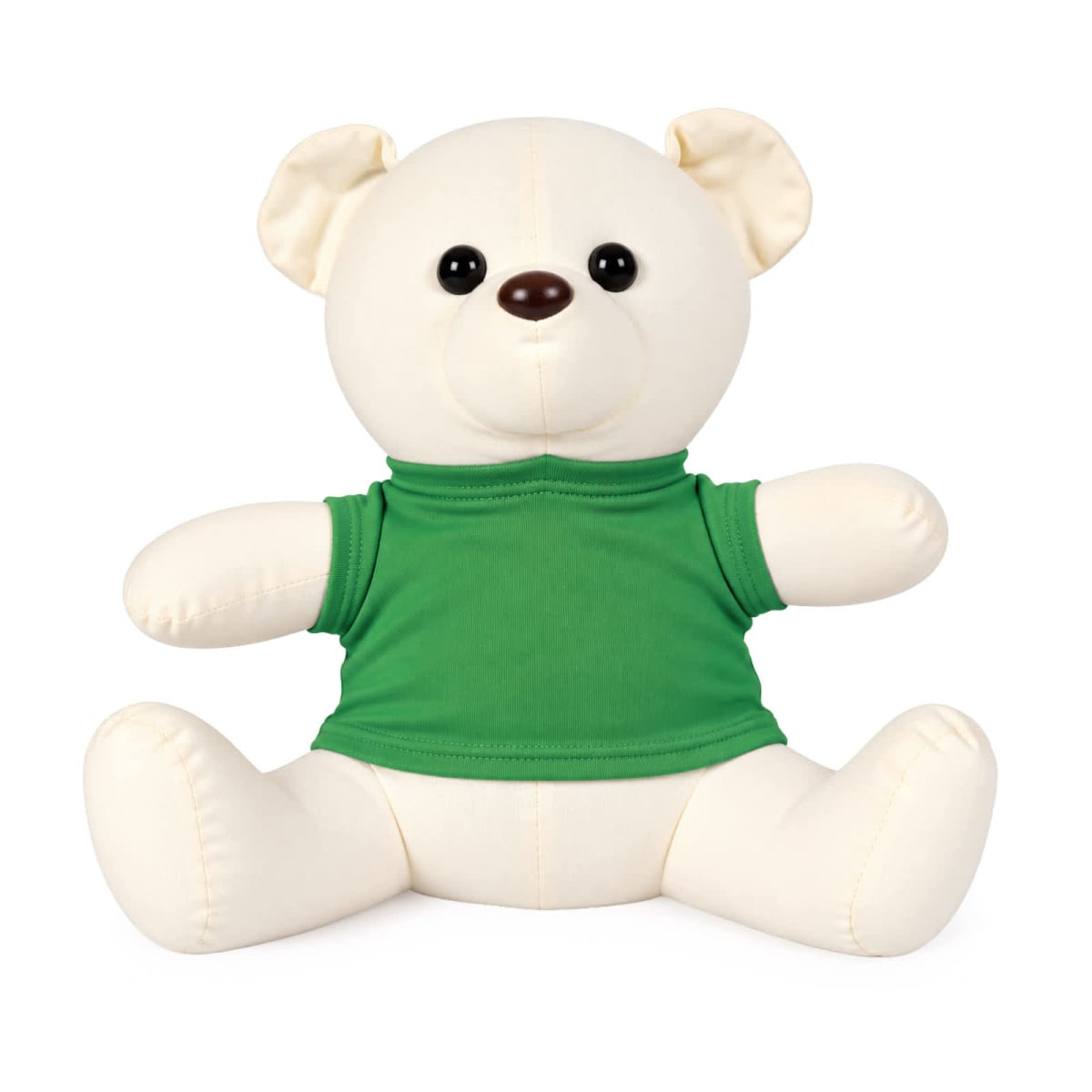 A plush calico bear with a cream body and green shirt, featuring large black eyes and a smiling expression.