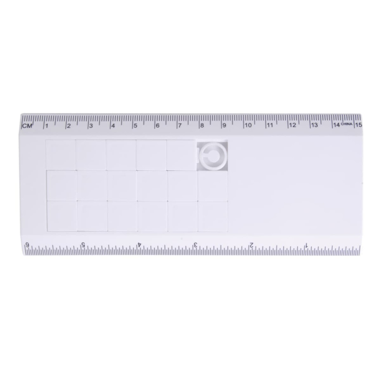 Amaze Tile Ruler Puzzle in white with a grid pattern and measurement markings along one edge. Features a circular cutout.