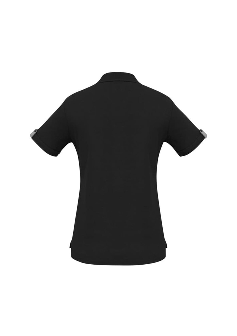 A black women's polo shirt with short sleeves and a subtle logo on the sleeve.