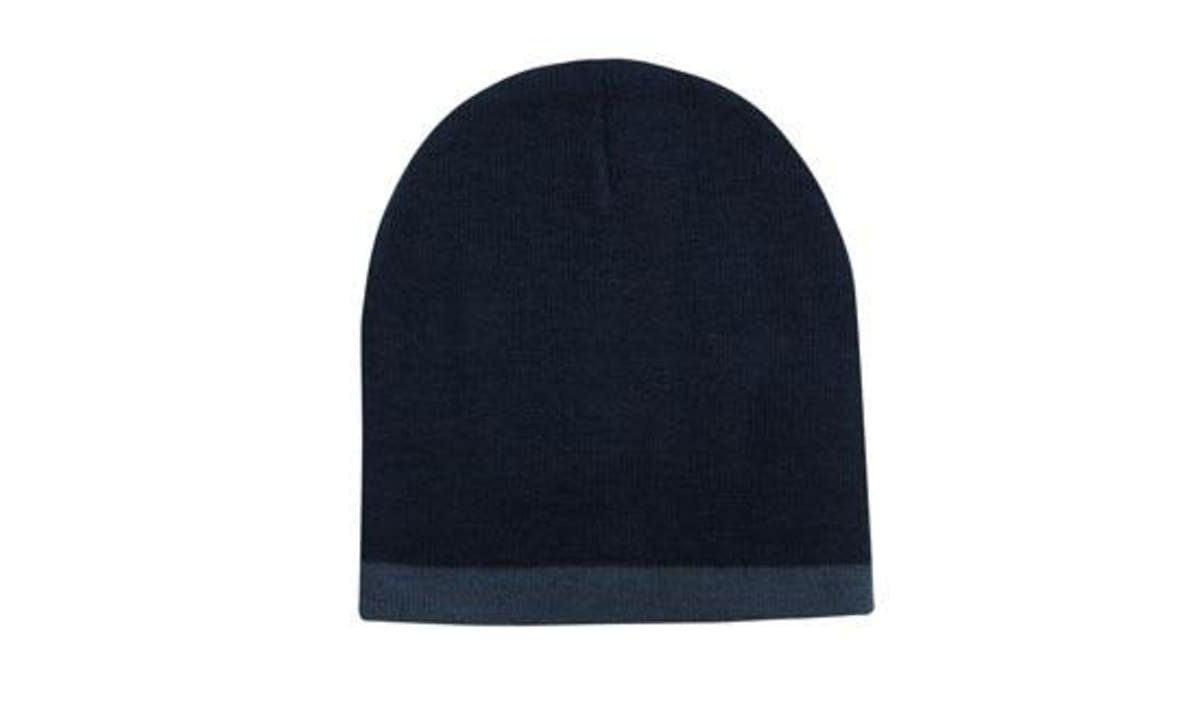 A navy blue beanie with a two-tone design, featuring a rolled-down cuff. It has a logo.