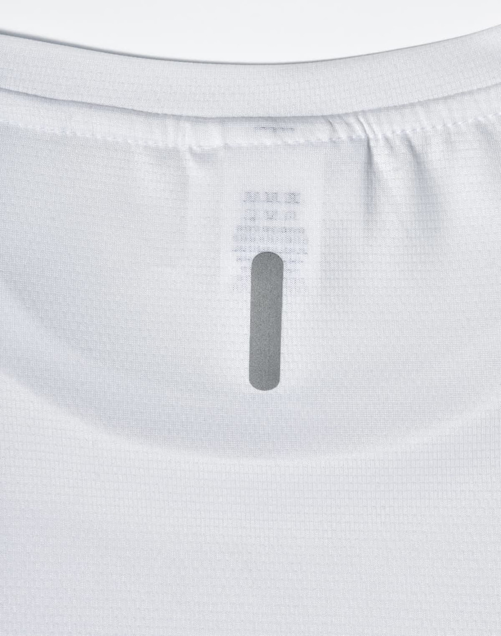 A white lightweight performance t-shirt featuring a label at the neckline and a simple design.
