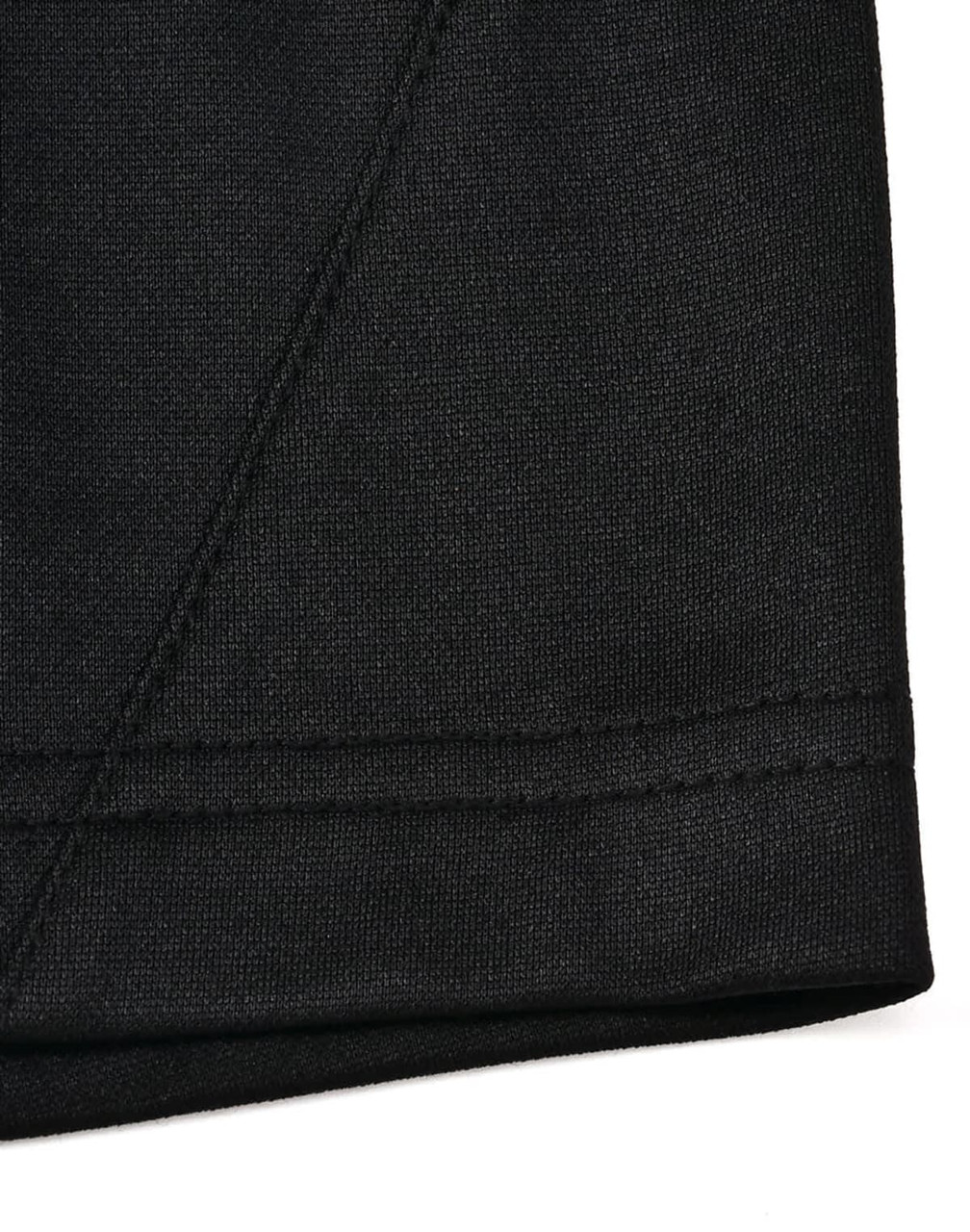 A close-up of a black polo shirt featuring a contrast collar and short sleeves, with visible stitching details.