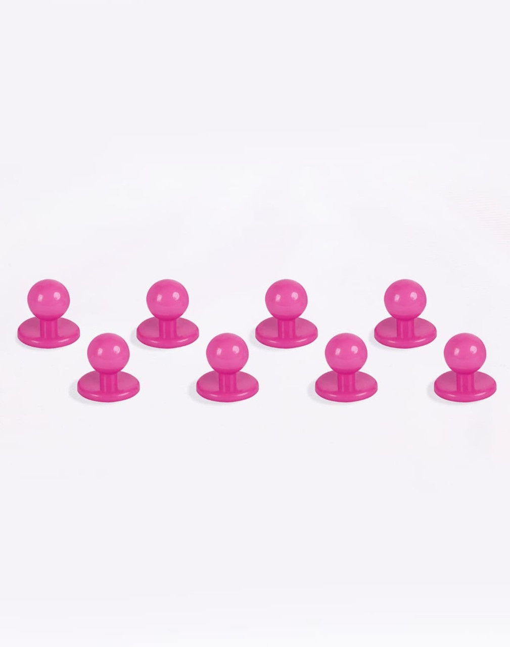 A set of eight pink exchangeable buttons for chef uniforms, featuring round tops and flat bases.