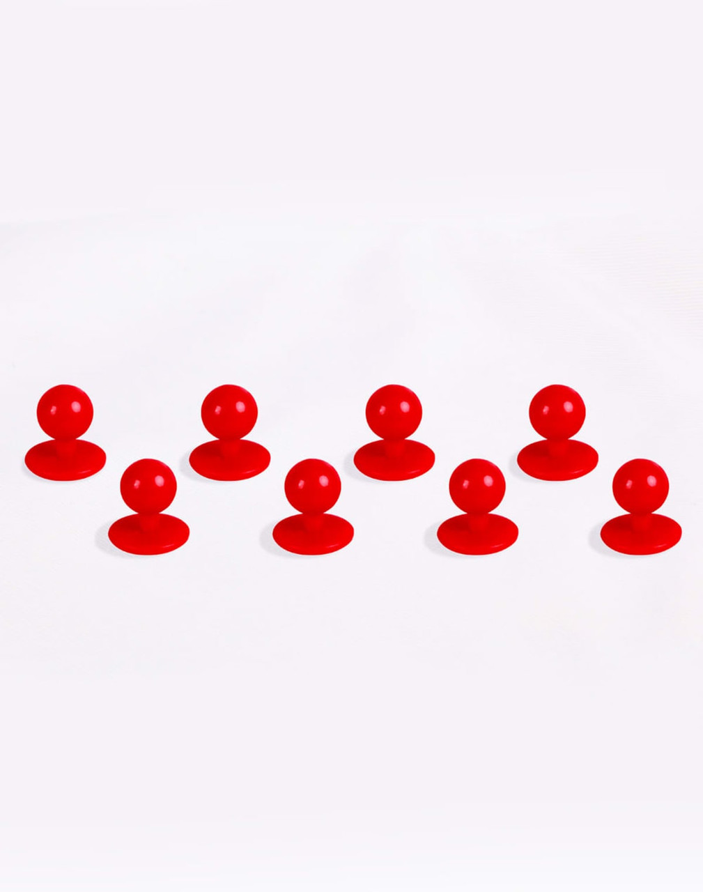 Eight red exchangeable buttons displayed on a light background, with a simple circular design.