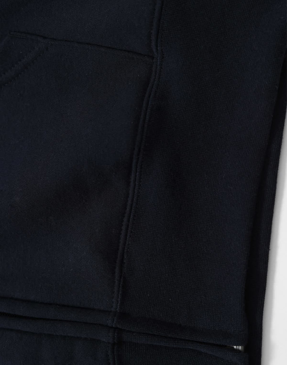A black full-zip fleecy hoodie featuring a front pocket and a smooth texture. It has a logo on the fabric.