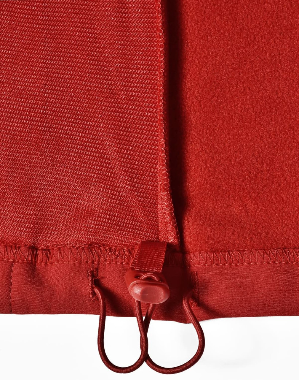 A red softshell vest featuring a drawstring adjuster at the hem and a smooth textured fabric.