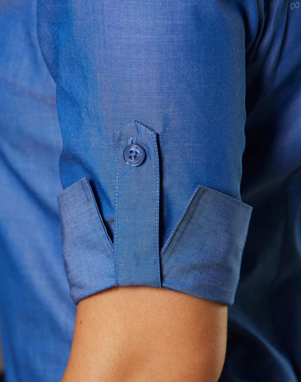 A blue women's button-up shirt featuring 3/4 sleeves with button details and a sleek finish.