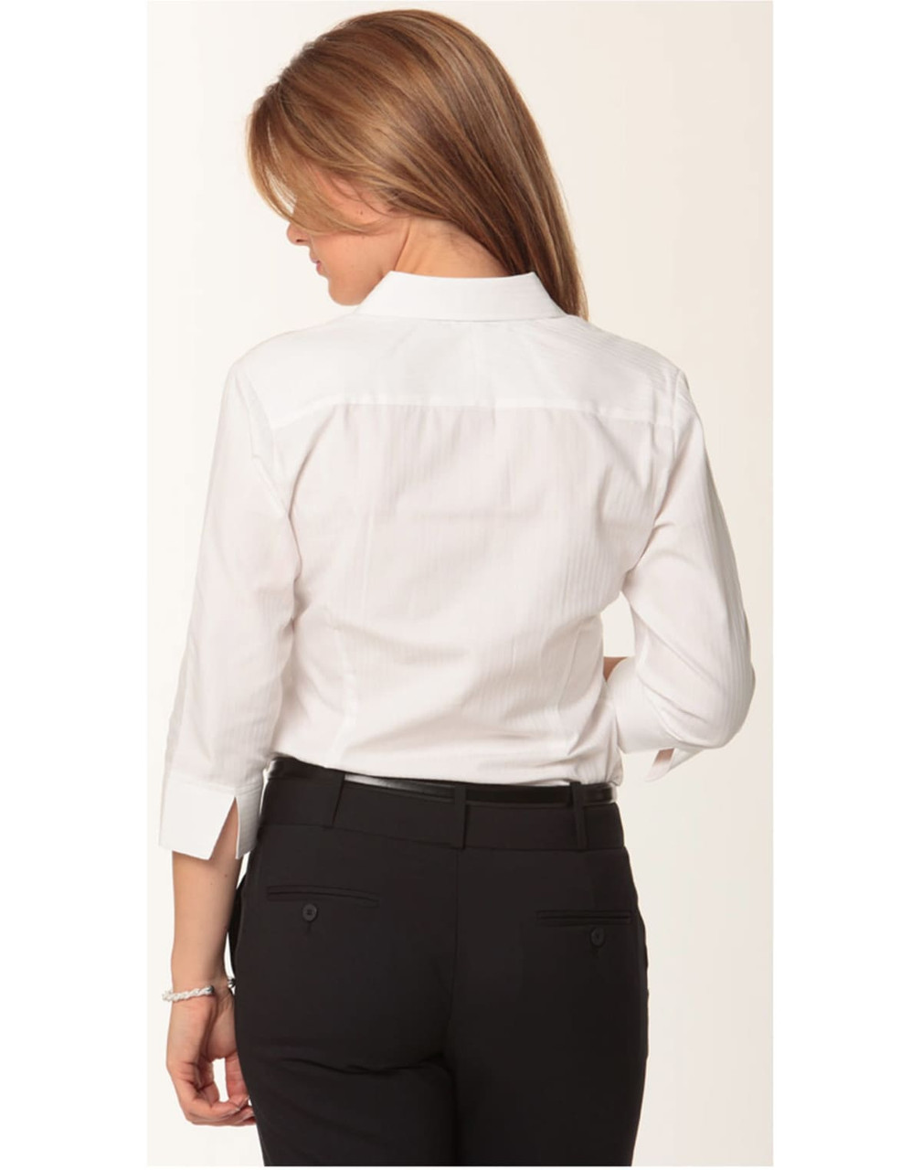 A white women's mini herringbone 3/4 sleeve button-up shirt with a back yoke detail. Features include a logo on the side.