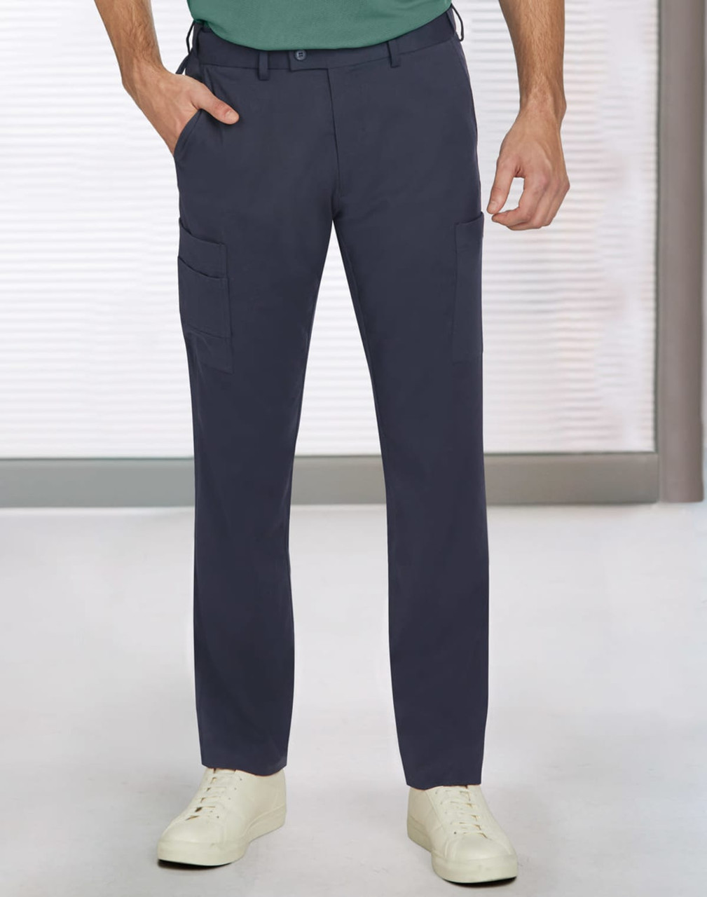 Men's utility cargo pants in navy blue with two side pockets, paired with white sneakers. Features a logo on the waistband.