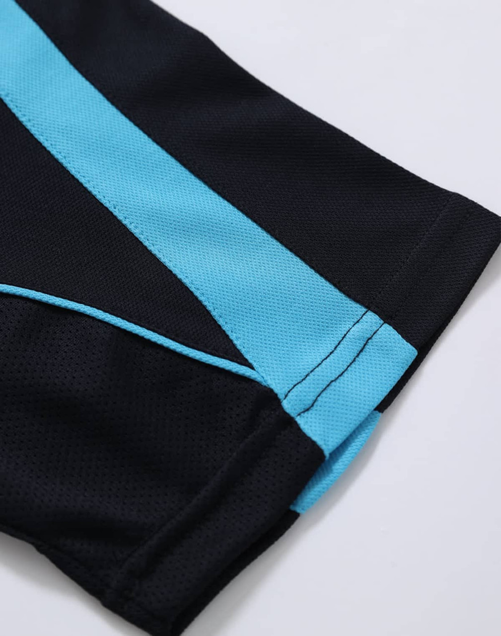A black polo shirt featuring aqua blue stripes, with a logo on the design. The fabric appears textured.
