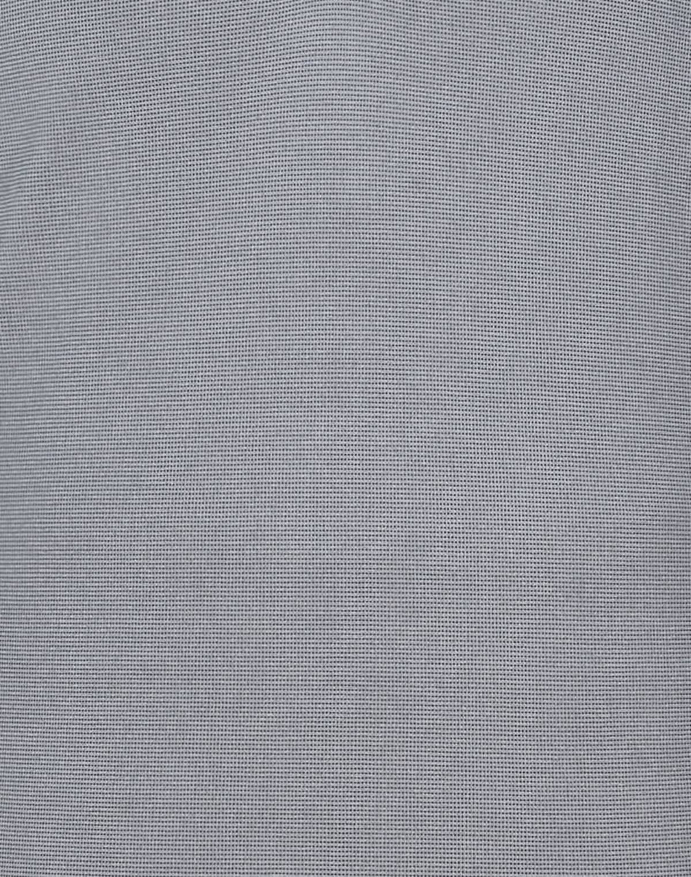 A light blue polo shirt featuring a textured pattern and a logo.
