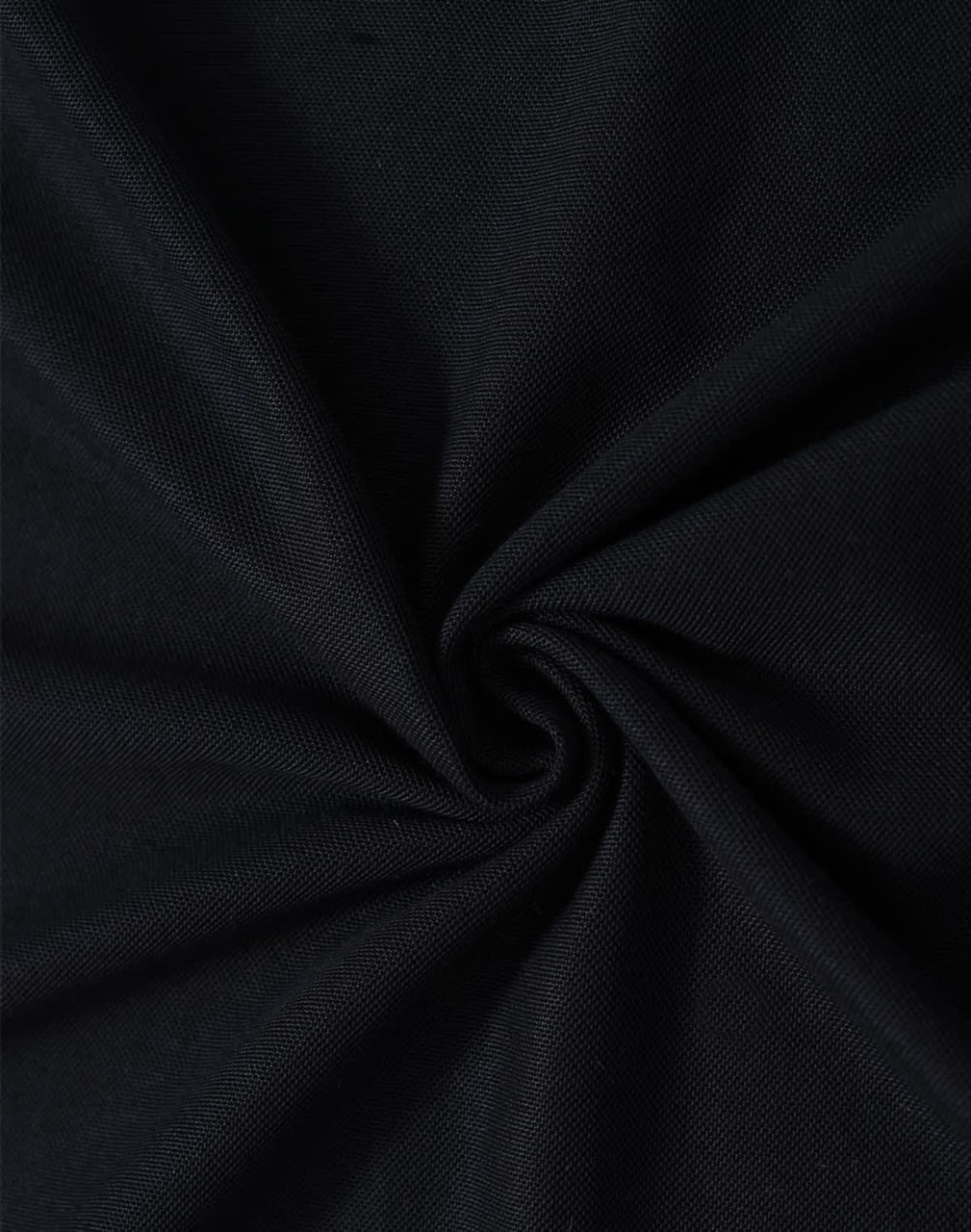 A close-up of black fabric in a swirling pattern, showcasing the texture and weave of the material.