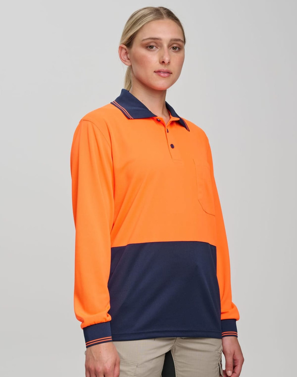 A bright orange and navy long-sleeve safety polo shirt with a pocket and a logo.