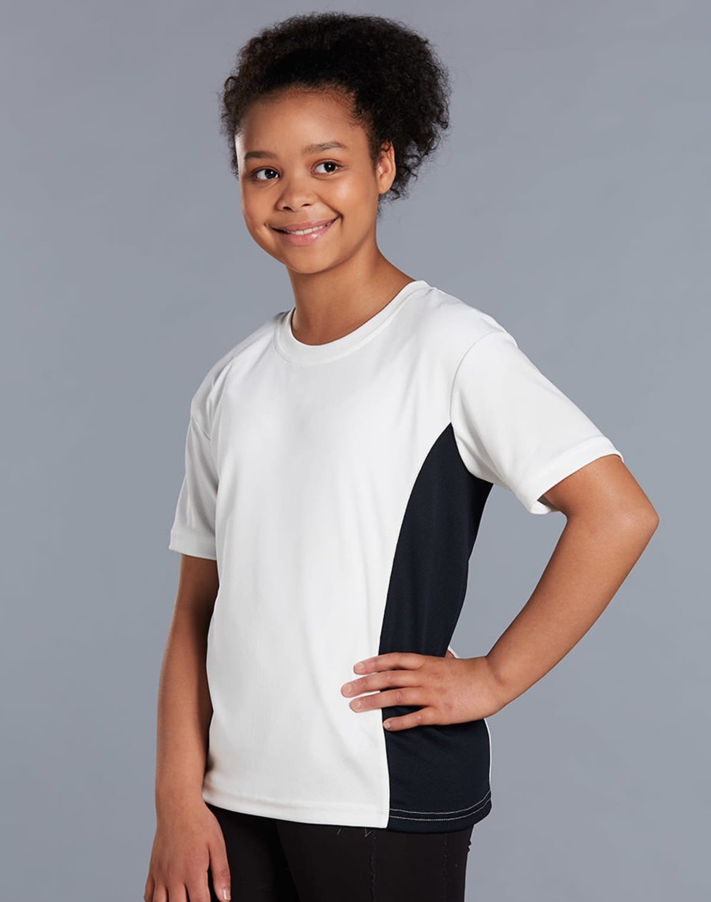 A child wearing a short-sleeved white and navy contrast tee with a logo on it.