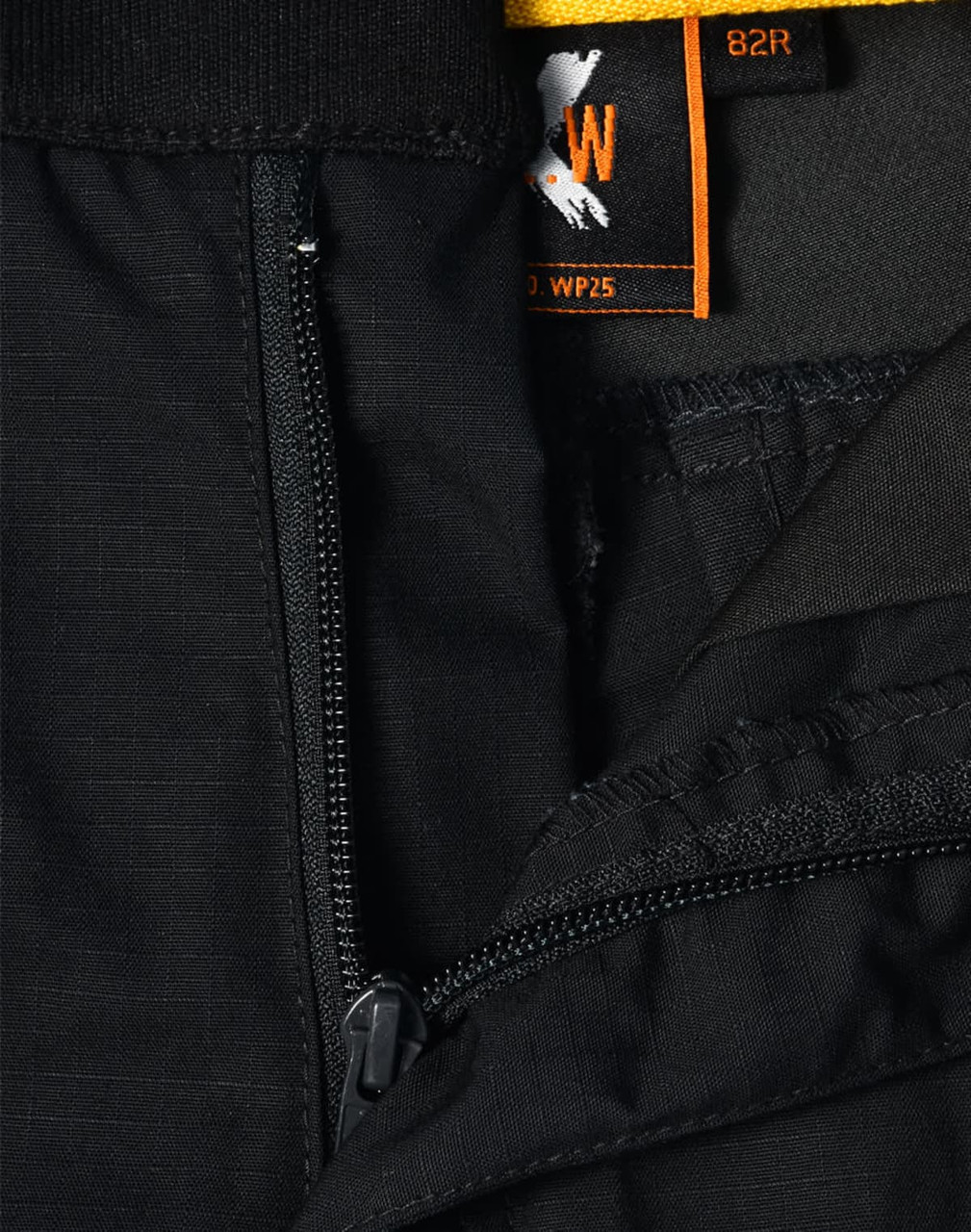 Close-up of black Rip-Stop Poly/Cotton Stretch Work Shorts, featuring zippers and an inner lining detail.