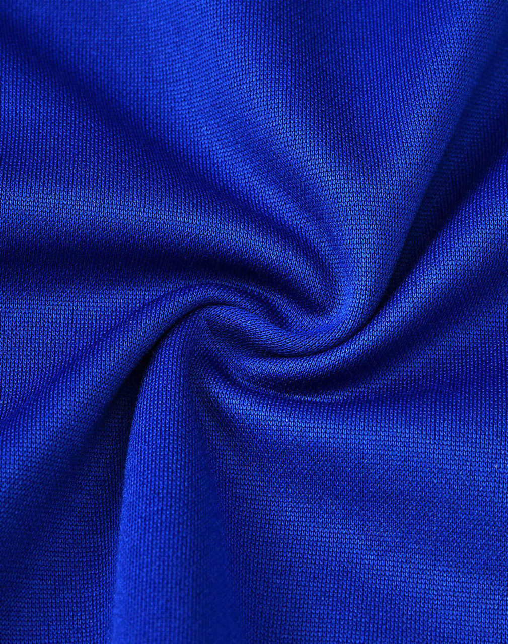 A close-up of textured fabric in vibrant blue, showcasing the material's softness and finish.
