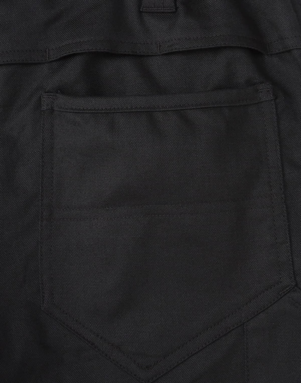 A close-up of black cotton stretch ripstop work pants, featuring a back pocket design and fabric texture.