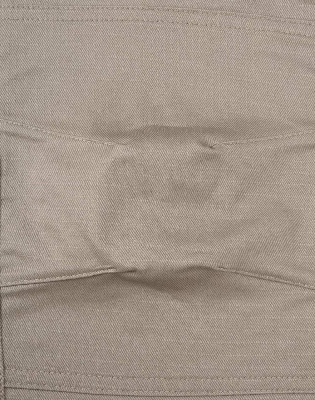 A close-up of unisex cotton stretch ripstop work pants in a light beige colour, featuring a stitched waistband and branding.