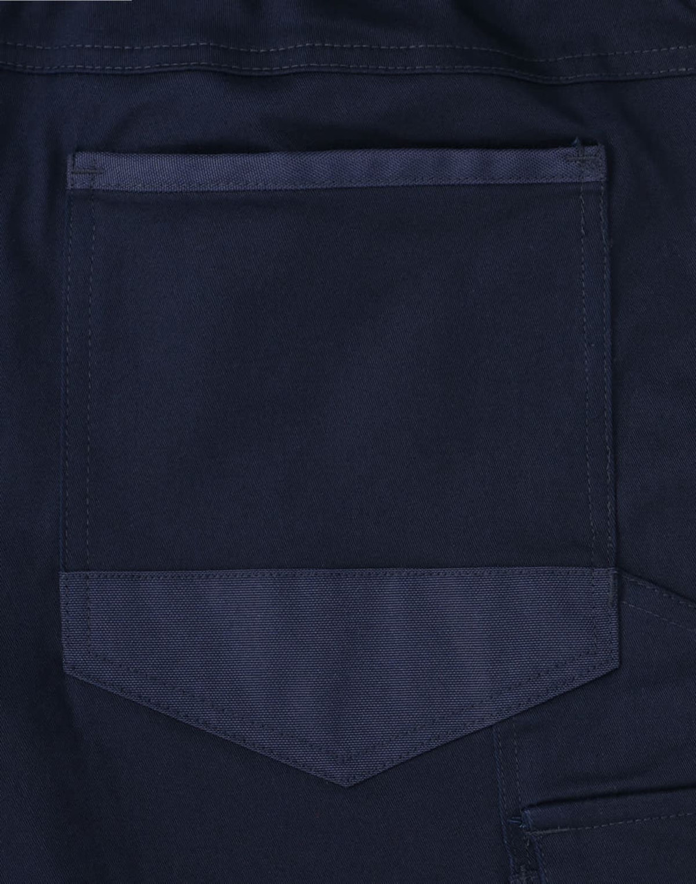 A navy blue fabric with a pocket detail, part of the unisex cotton stretch cuffed work pants.